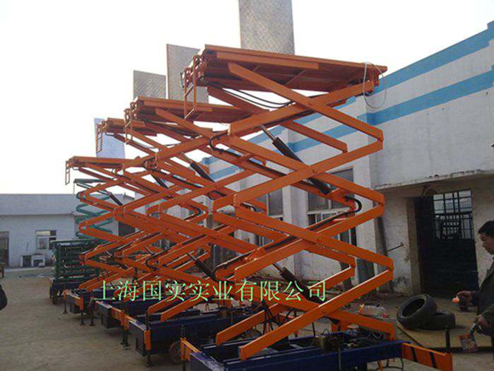 移动剪叉式升降平台--上海国实专业升降机生产厂家 SJY0.3-6